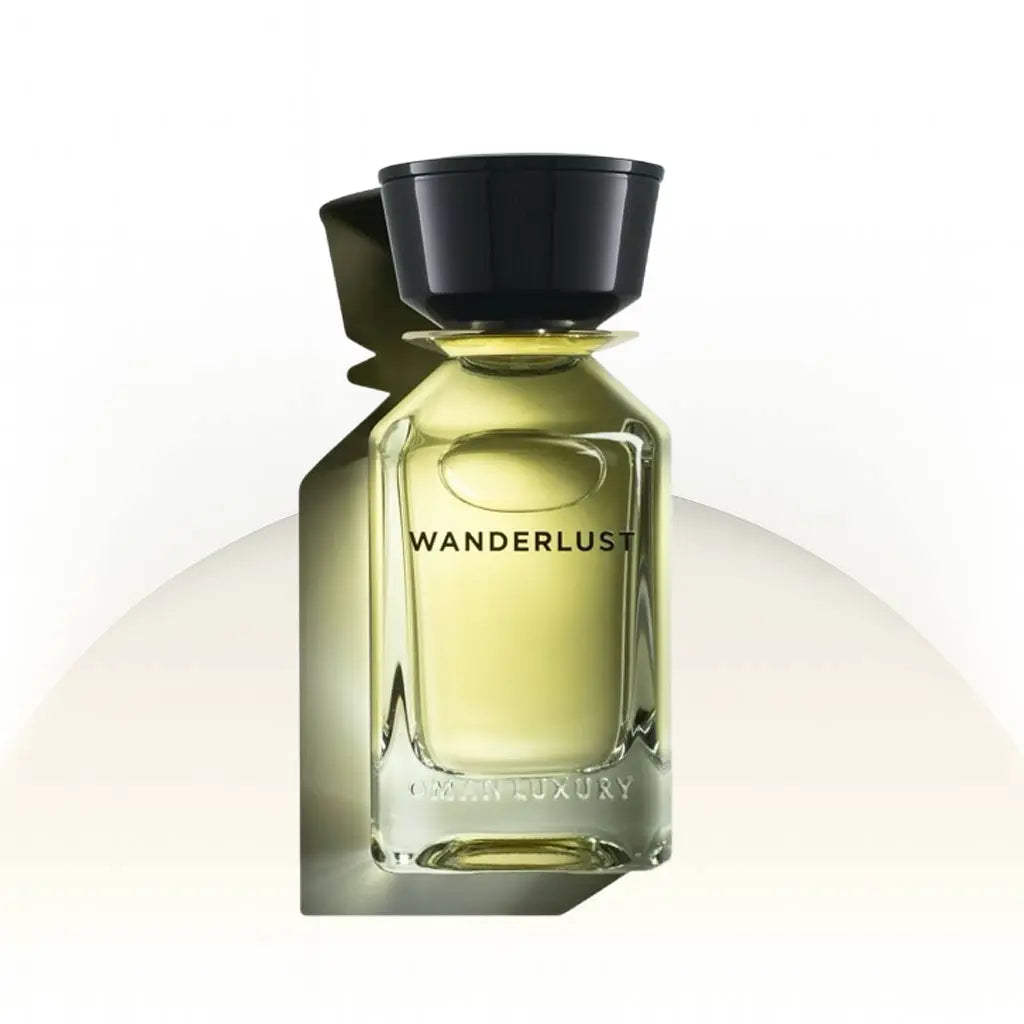 Wanderlust Omanluxury בושם נישה יוניסקס 100 מ״ל EDP | דיקנט 10 מ״ל | לימון, ברגמוט, פלפל ורוד, קסיס, קינמון, זעפרן, עץ גאיאק, ארז ולבונה
