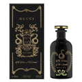 תקריב תווית הבקבוק The Voice Of The Snake Gucci – מראה יוקרתי ומדויק